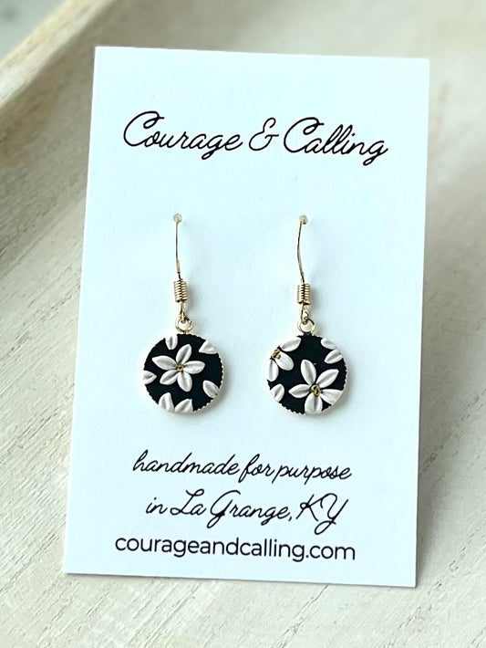 Circle Framed Daisy Charm Dangles in Black