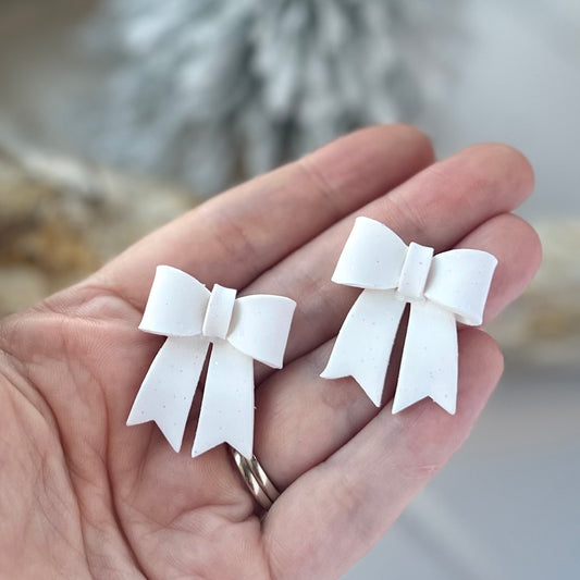 Frosted Bow Statement Studs