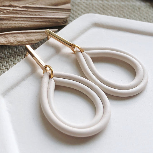 Piped Teardrop Dangles in Cream